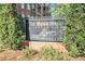 Elegant entrance sign for The Manor House, a prestigious condominium complex at 50 Biscayne Nw Dr # 5112, Atlanta, GA 30309