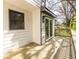 Open-air deck featuring wood floors and railings, providing a relaxing outdoor space and natural light at 2411 Charleston Oaks Ln, Decatur, GA 30030