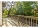 Open-air deck overlooking lush greenery, offering a serene outdoor retreat at 2411 Charleston Oaks Ln, Decatur, GA 30030