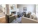 Comfortable living room with a fireplace, stylish seating, and hardwood floors at 2411 Charleston Oaks Ln, Decatur, GA 30030