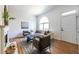 Bright living room with fireplace, hardwood floors, and cozy seating with an arched window at 2411 Charleston Oaks Ln, Decatur, GA 30030