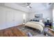 Spacious main bedroom with tray ceiling, hardwood floors, and a sitting area at 2411 Charleston Oaks Ln, Decatur, GA 30030