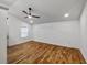 This primary bedroom features hardwood floors, recessed lighting, ceiling fan, and bright white walls at 1330 Lanvale Sw Dr, Atlanta, GA 30310