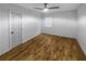 Bright bedroom with hardwood floors, a window, and a minimalist aesthetic at 1330 Lanvale Sw Dr, Atlanta, GA 30310