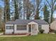 Charming single-story home with a well-manicured lawn and inviting front porch at 1330 Lanvale Sw Dr, Atlanta, GA 30310