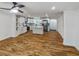 Spacious kitchen featuring hardwood floors, white cabinets, and stainless steel appliances at 1330 Lanvale Sw Dr, Atlanta, GA 30310