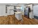 Modern kitchen featuring an island, stainless steel appliances, and ample cabinet space at 1330 Lanvale Sw Dr, Atlanta, GA 30310