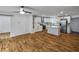 Spacious kitchen featuring hardwood floors, white cabinets, and stainless steel appliances at 1330 Lanvale Sw Dr, Atlanta, GA 30310