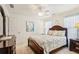 Bedroom with natural light, queen size bed, and neutral color scheme at 215 Morning Glory Rdg, Canton, GA 30115