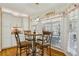 Bright breakfast nook featuring a table and chairs by the window at 215 Morning Glory Rdg, Canton, GA 30115