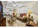 Living room showcases leather furniture and custom decor details at 215 Morning Glory Rdg, Canton, GA 30115