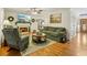 Cozy living room with fireplace, hardwood floors and comfortable seating at 215 Morning Glory Rdg, Canton, GA 30115