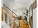 Inviting living room view with staircase and hardwood floors at 215 Morning Glory Rdg, Canton, GA 30115