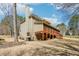 Two-story home with large screened back porch and spacious yard at 215 Morning Glory Rdg, Canton, GA 30115