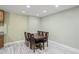Well-lit dining area featuring tile floors and neutral paint at 3087 Colonial Way # J, Atlanta, GA 30341