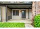 Inviting entrance with a covered porch and well-maintained landscaping at 3087 Colonial Way # J, Atlanta, GA 30341
