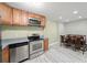 Efficient kitchen featuring stainless steel appliances and ample cabinet space at 3087 Colonial Way # J, Atlanta, GA 30341