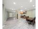Open-concept living space combining kitchen, dining, and living areas for seamless entertaining at 3087 Colonial Way # J, Atlanta, GA 30341
