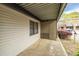 Covered patio with vinyl siding and space for outdoor seating at 3087 Colonial Way # J, Atlanta, GA 30341