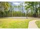 Community tennis court in a wooded setting at 3087 Colonial Way # J, Atlanta, GA 30341