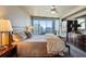 Bedroom features a ceiling fan and floor to ceiling windows with beautiful views at 3338 Peachtree Ne Rd # 2405, Atlanta, GA 30326