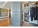 A well-organized walk-in closet provides ample storage space at 3338 Peachtree Ne Rd # 2405, Atlanta, GA 30326