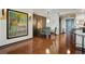 Dining area with modern lighting, bar seating, and a view of the artwork at 3338 Peachtree Ne Rd # 2405, Atlanta, GA 30326