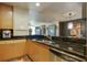 Spacious kitchen with stainless steel appliances, stone counters, and modern design at 3338 Peachtree Ne Rd # 2405, Atlanta, GA 30326