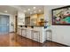 Kitchen bar features stainless steel appliances and contemporary bar seating at 3338 Peachtree Ne Rd # 2405, Atlanta, GA 30326