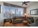 Living room has beautiful city views from its large window at 3338 Peachtree Ne Rd # 2405, Atlanta, GA 30326