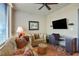 The living room has comfortable seating and a mounted television at 3338 Peachtree Ne Rd # 2405, Atlanta, GA 30326