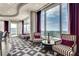 Comfortable lounge area with stylish seating and large windows offering city views at 3338 Peachtree Ne Rd # 2405, Atlanta, GA 30326