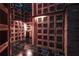 Custom wine cellar featuring wooden storage lockers and a unique ladder for easy access at 3338 Peachtree Ne Rd # 2405, Atlanta, GA 30326