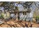 Fenced backyard with new landscaping and rear entrance to home and new steps at 2126 Jernigan Se Dr, Atlanta, GA 30315