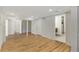 Finished basement with wood flooring and ample space at 2126 Jernigan Se Dr, Atlanta, GA 30315