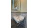 Stylish bathroom sink with modern fixtures and an illuminated mirror at 2126 Jernigan Se Dr, Atlanta, GA 30315