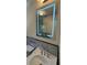 Stylish bathroom sink with modern fixtures and an illuminated mirror at 2126 Jernigan Se Dr, Atlanta, GA 30315