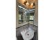 Stylish bathroom sink with modern fixtures and mirrored medicine cabinet at 2126 Jernigan Se Dr, Atlanta, GA 30315