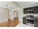 Modern kitchen with stainless steel appliances and adjacent dining area at 2126 Jernigan Se Dr, Atlanta, GA 30315