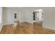Bright living room featuring hardwood floors and views through multiple doorways at 2126 Jernigan Se Dr, Atlanta, GA 30315