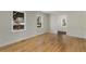 Hardwood floors with natural light through two windows in the living room at 2126 Jernigan Se Dr, Atlanta, GA 30315