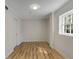 Neutral room featuring wood floors and neutral paint. Perfect for entertaining at 2126 Jernigan Se Dr, Atlanta, GA 30315