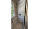 Modern shower with marble tiling and glass door at 2126 Jernigan Se Dr, Atlanta, GA 30315