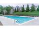 Outdoor pool with steel railing, green grassy hill, and evergreen trees at 2449 Suwanee Pointe Dr, Lawrenceville, GA 30043