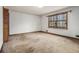 Spacious bedroom offering natural light, carpet, closet space, and potential for personalization at 444 Wellington Way, Jonesboro, GA 30238