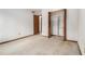 Bedroom includes a closet, neutral walls, and carpeted floor, offering space for comfort at 444 Wellington Way, Jonesboro, GA 30238