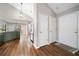 Foyer featuring hardwood floors that lead to the kitchen at 455 Ellesmere Way, Buford, GA 30518