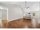 Spacious living room with hardwood floors and a fireplace at 455 Ellesmere Way, Buford, GA 30518