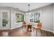 Cozy sitting area featuring hardwood floors, natural light, and neutral walls perfect for relaxation at 455 Ellesmere Way, Buford, GA 30518