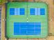 Aerial view of Lenox Park tennis and pickleball courts with pristine blue surfaces at 455 Ellesmere Way, Buford, GA 30518